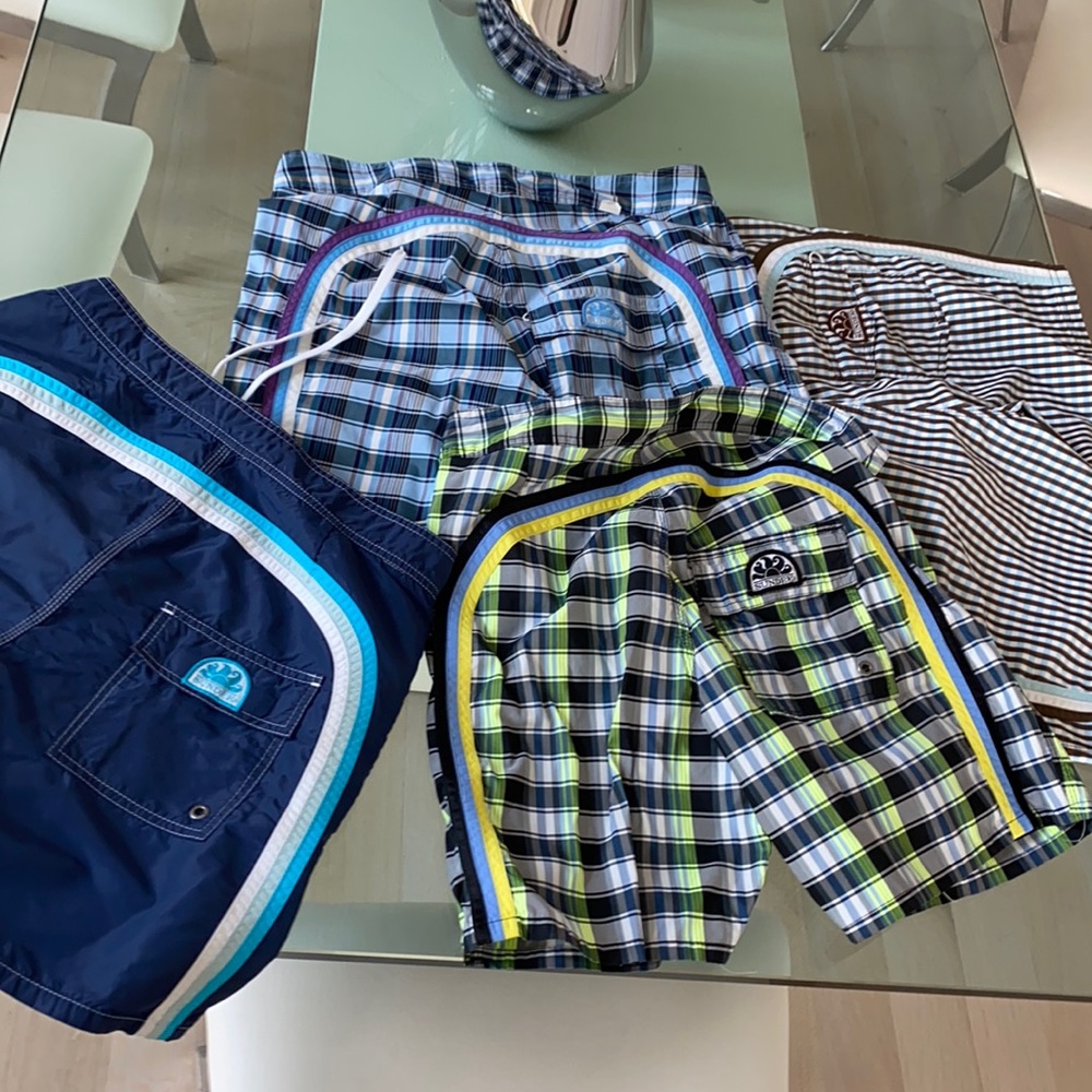 Includes all 4 sundek men’s shorts for a hood price